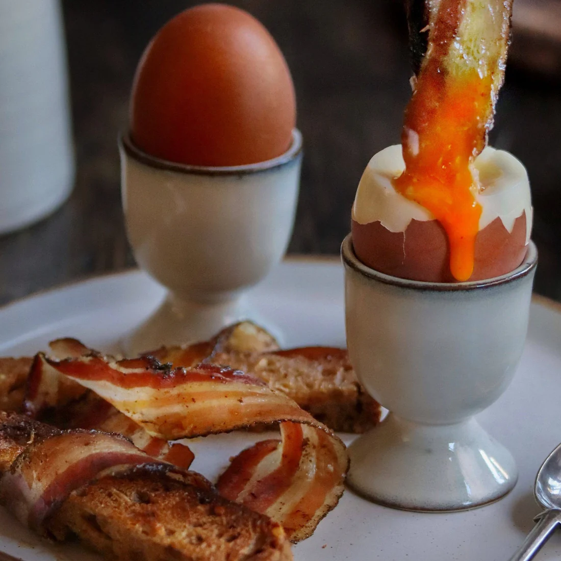 Air dried pork belly thins served with eggs